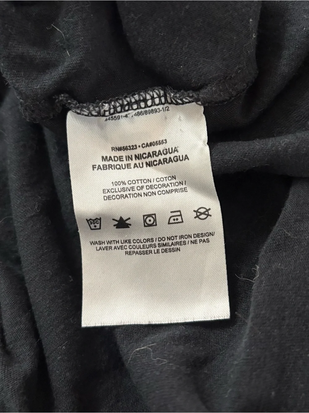 Nike Women’s Black Graphic Tee — Not Just Attractive